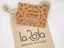 Carte cadeau en bois de chêne gravé au laser. Design élégant et minimaliste, mettant en valeur la personnalisation avec un message gravé.